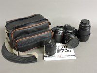 Lot 102 - A Nikon F70 SLR 335mm camera