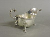 Lot 109 - A silver sauce boat