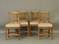 Lot 435 - A set of four East Anglian fruitwood single chairs