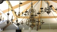 Lot 440 - A brass Dutch style twelve branch chandelier