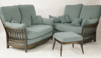 Lot 392 - A pair of Ercol two seater settees