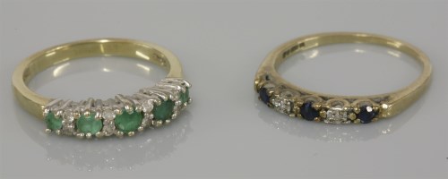 Lot 3 - A 9ct gold five stone emerald ring
