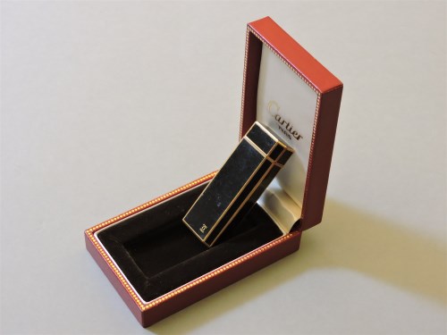 Lot 75 - A Cartier black lacquer lighter