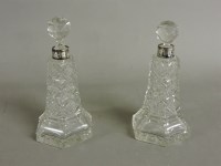 Lot 144 - A pair of scent bottles and stoppers
