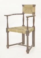 Lot 78 - An oak armchair