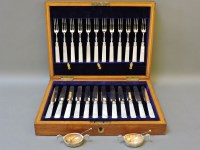 Lot 133 - A cased set of two fruit knives and forks