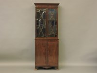 Lot 421 - A small mahogany two part bookcase