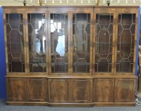 Lot 672 - A large mahogany three section glazed bookcase