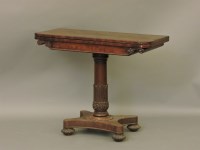 Lot 526 - A Regency fold over card table