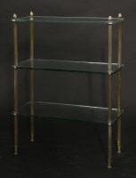 Lot 580 - A three-tier glass stand