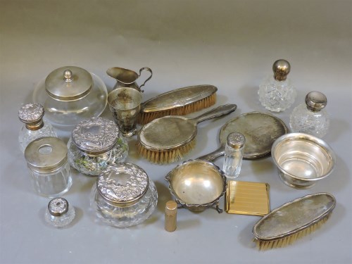 Lot 90 - A quantity of silver top dressing table bottles