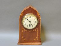 Lot 167 - An Edwardian inlaid mantel clock