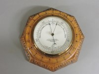 Lot 298 - A Victorian oak aneroid barometer