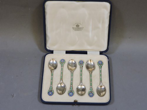 Lot 70 - A set of six silver and enamel coffee spoons