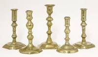 Lot 422 - Three brass candlesticks