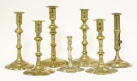 Lot 423 - A pair of brass candlesticks