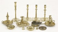 Lot 424 - A pair of brass candlesticks