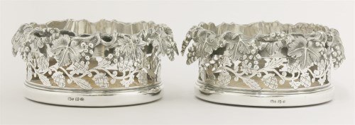 Lot 51 - A pair of Victorian silver-plated coasters