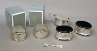Lot 87 - Three silver condiments with blue glass liners