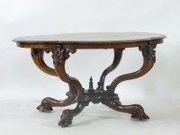 Lot 688 - A Victorian walnut centre table