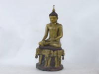 Lot 404 - A modern carved wooden figure of Buddha