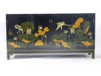 Lot 682 - A black lacquered side cabinet