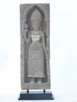 Lot 406 - A Thai carved stone Deity