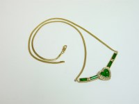 Lot 39 - A gold and diamond set heart necklace