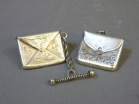 Lot 82 - Two small silver stamp cases