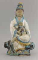 Lot 22 - An unusual biscuit figure of Guanyin