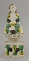 Lot 23 - A biscuit porcelain figure of Guanyin