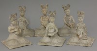 Lot 494 - A band of six pottery musicians