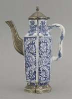 Lot 21 - A rare moulded blue and white Ewer