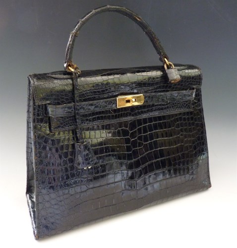 Lot 386 - An Hermès Paris black crocodile skin 'Kelly' bag