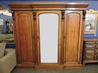 Lot 487 - A Victorian mahogany triple door wardrobe