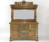 Lot 353 - An Arts and Crafts oak mirror back sideboard