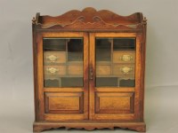 Lot 348 - An Edwardian oak top smoker's cabinet