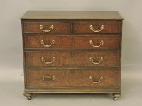 Lot 405 - A George III oak chest of drawers