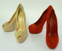 Lot 143 - A  pair of Yves St Laurent red suede platform high heel shoes