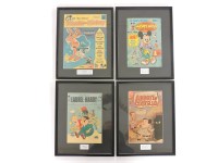 Lot 325 - Four framed comic covers