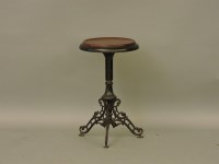 Lot 387 - A Victorian cast iron revolving top stool