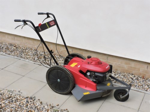 Lot 516 - A Honda UM516C petrol 'grass manager'
