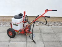 Lot 519 - An SCH supplied push along garden sprayer