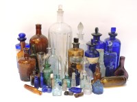 Lot 214 - A collection of glass poison and chemist's medicine bottles