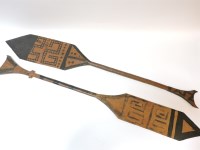 Lot 318 - Two Guyana carved wooden paddles