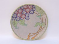 Lot 185 - An Art Deco Crown Ducal Charlotte Rhead tube lined floral decorated charger