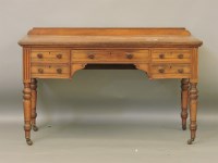 Lot 494 - A late Victorian walnut kneehole dressing table
