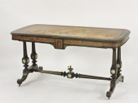 Lot 503 - An Edwards & Roberts ebonised and burr yew wood library table