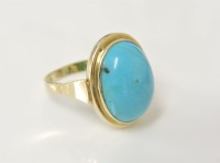 Lot 10 - A 14ct gold oval turquoise cabochon set ring