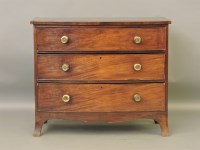 Lot 380 - A George III bow front chest